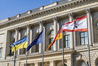 A picture of the flags on the House of Representatives, Berlin's state parliament