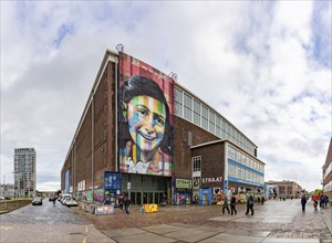 A picture of the Let Me Be Myself colorful mural, depicting Anne Frank, created by Eduardo Kobra in