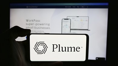 Stuttgart, Germany, 07-11-2024: Person holding cellphone with logo of US company Plume Design Inc.