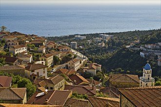 The picturesque greek style village of Dhermi at the coastal road of Albania photographed from the