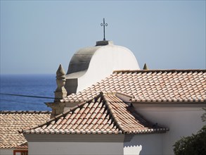 Mother Church with Ocean in the background in Albufeira, Algarve, Portugal, Europe