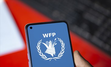 World Food Programme (WFP) logo is displayed on smartphone.