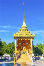 Golden Big Buddha statue in holy shrine in Wat Phadung Tham Phothi temple in Khao Lak Phang-nga