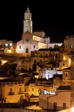 Scenic illuminated cathedral of Matera at night, Italy, Europe