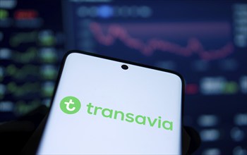 Transavia logo is displayed on smartphone.