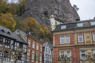 An old half-timbered town in autumn. A church was built into a rock here. Unique German