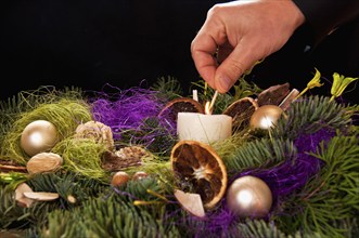 Christmas floral table decoration withe hand and match