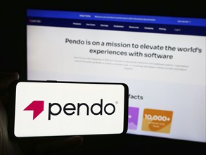 Stuttgart, Germany, 07-11-2024: Person holding cellphone with logo of US software company Pendo.io