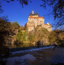 Kriebstein Castle rises on a steep rock above the Zschopau. Within the large group of hilltop