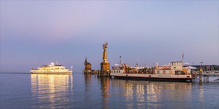 Excursion boat, the Imperia and restaurant on the historic ferry Constance in the harbour,