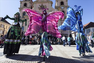 Venetian carnival mask and costume at the Venetian fair on the historic market square, Ludwigsburg,