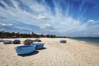 Coracle fishing boats on beach. Mui Ne, Phan Tiet, Vietnam, Asia