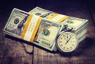 Time is money loan concept background. Vintage retro effect filtered hipster style image of