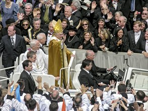 Pope Benedict XVI Joseph Ratzinger among crowds in the Popemobile after the enthronement on 24. 04.