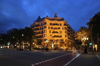 BARCELONA, SPAIN, APRIL 17, 2019: Night view of famous Casa Mila house know as La Pedrera modernist