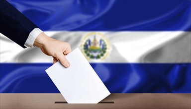 El Salvador presidential elections concept. Hand holding ballot in voting ballot box with El