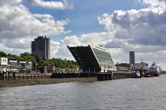 Jetty with striking Dockland office building, modern architecture, landmark in the Port of Hamburg,