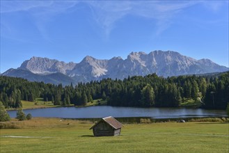 View of the Karwendel Mountains near Mittenwald, in the foreground Lake Gerold in Werdenfelser