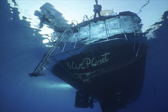 Safari boat, dive boat, livaboard Blue Planet from below, ladder, exit. Dive site Shaab El Erg,