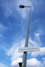 Lantern against a blue sky with sign Transport Ministry, Berlin, Germany, Europe