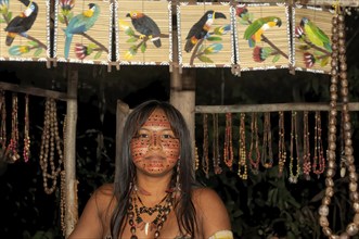 Portrait of a young Indian woman from the Dessanos tribe with traditional paintings on her face