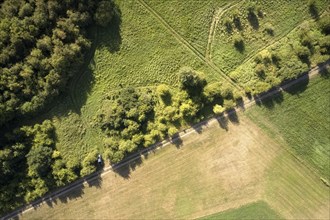 Aerial view of the Kolonnenweg along the former inner-German border, marking the green belt between