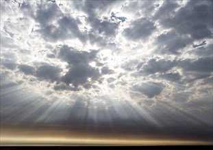 Sunrays and clouds over the desert, Namibia, Africa