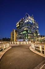 ZAANDAM, NETHERLANDS, MAY 8, 2017: Inntel Hotel in Zaandam illuminated at night. Design of