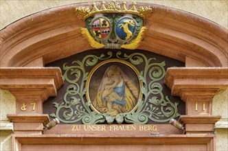 Depiction of Mary with the Child Jesus on the portal gable of the house Zu Unser Frauen Berg,