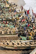 Traditional wooden fishing boats in the fishing harbour of Cape Coast, Cabo Corso, Ghana, West