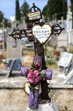 Cross on gravestone, cemetery in Puimoisson, Provence, region Provence-Alpes-Côte d'Azur,