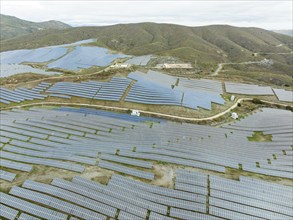 Rows of solar panels at the photovoltaic plant of Lucainena de las Torres, aerial view, drone shot,