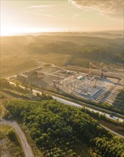 Aerial view during the construction of the Lindenrain industrial park with fog at sunrise Black