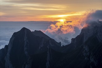 Freiheittürm and Fälenschafberg, sunrise, sun shining over mountains in fog, Säntis, Appenzell