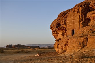 Nabataean tomb at Djabal Al-Ahmar in first daylight, Hegra or Mada'in Salih, AlUla region, Medina