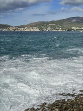 Surf, spray, waves breaking on the rocky coast, behind Peguera, Majorca, Spain, Europe