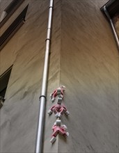 Figures on a house wall, Berlin, Germany, Europe