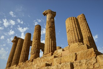 Super wide angle shot, columns, chapter, entablature, Hera temple, blue sky, late afternoon light,