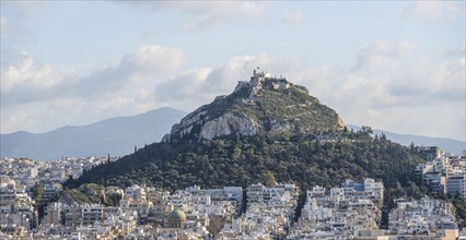 View over houses of Athens with Mount Lycabettus, Athens, Attica, Greece, Europe