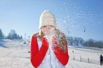 Young woman in winter in Geising