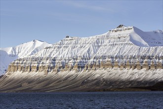 Snow covered mountains at Billefjorden, central fjord of the Isfjorden, Svalbard, Spitsbergen,