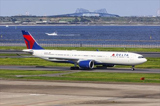 A Delta Air Lines Airbus A330-900 aircraft with the registration number N421DX at Tokyo Haneda