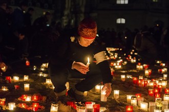 On the 69th anniversary of the Allied bombing of Dresden, Dresdeners commemorate with candles at