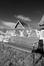 Park bench, bench, wooden bench in front of a wooden house in Karlskrona, Sweden, Europe