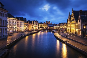 Ghent canal, Graslei and Korenlei streets in the evening. Ghent, Belgium, Europe