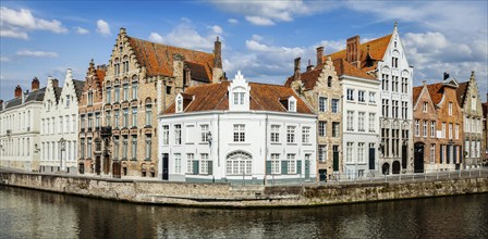 Panorama of Bruges canal and old historic houses of medieval architecture. Brugge, Belgium, Europe