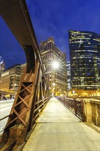 Skyline skyscrapers skyscrapers with Franklin-Orleans Street Bridge bridge at night in Chicago,