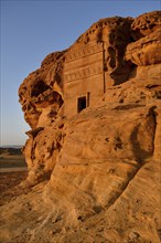 Nabataean tomb at Djabal Al-Ahmar in first daylight, Hegra or Mada'in Salih, AlUla region, Medina