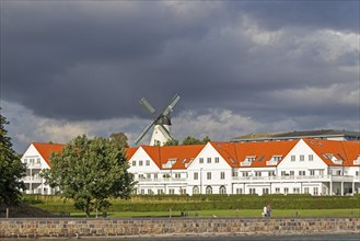 Windmill, houses, rain clouds, Sønderborg, Syddanmark, Denmark, Europe