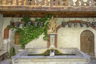 Water basin and fire bucket with statue of St Christopher, Churburg Castle, Schluderns, South